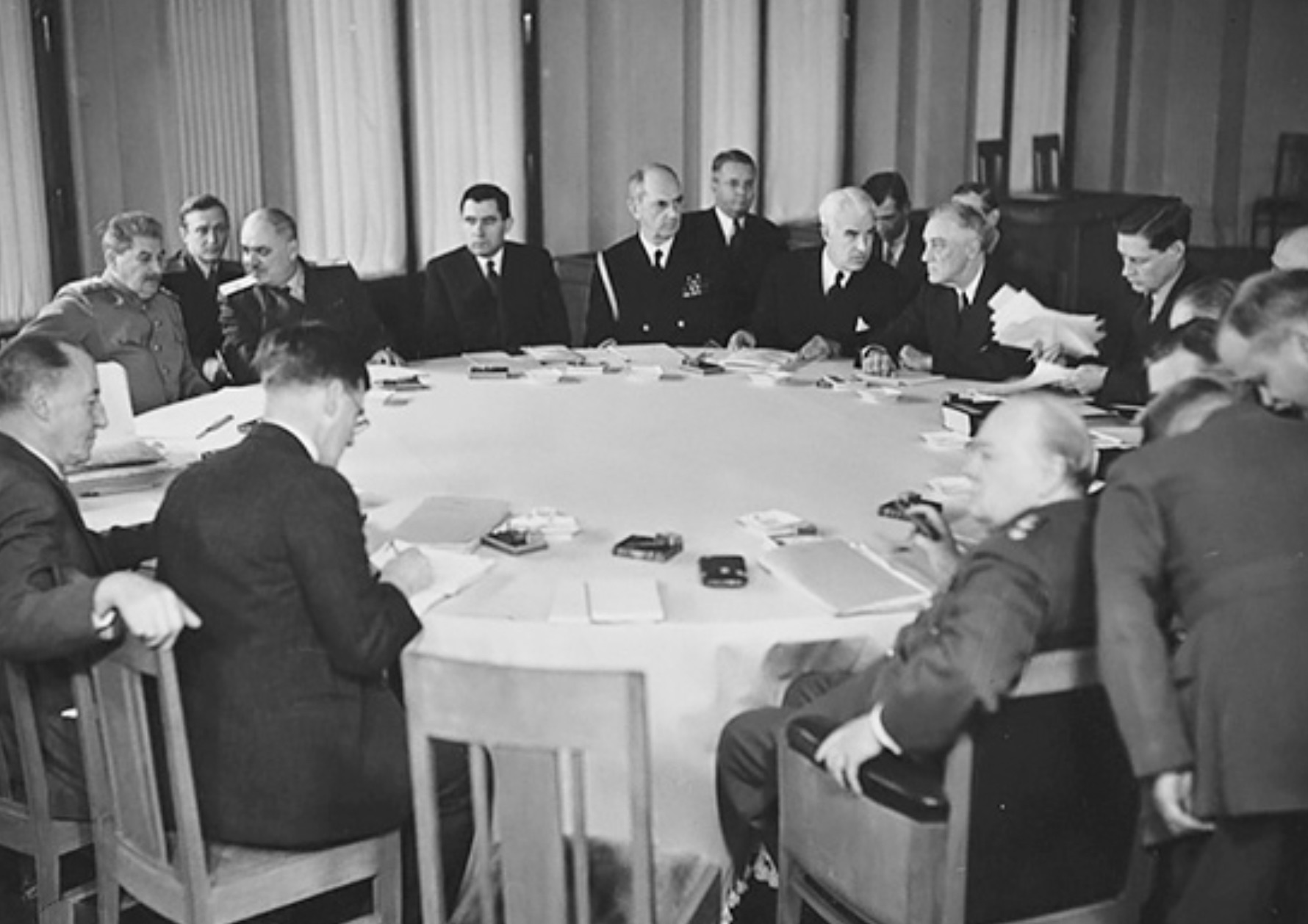 Leaders of the Big Three at the negotiating table at the Yalta conference.